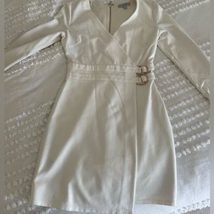 White Bodycon GUESS dress with gold hardware on the front